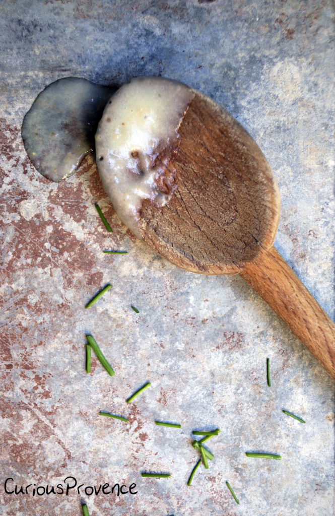 foodie soup on wooden spoon