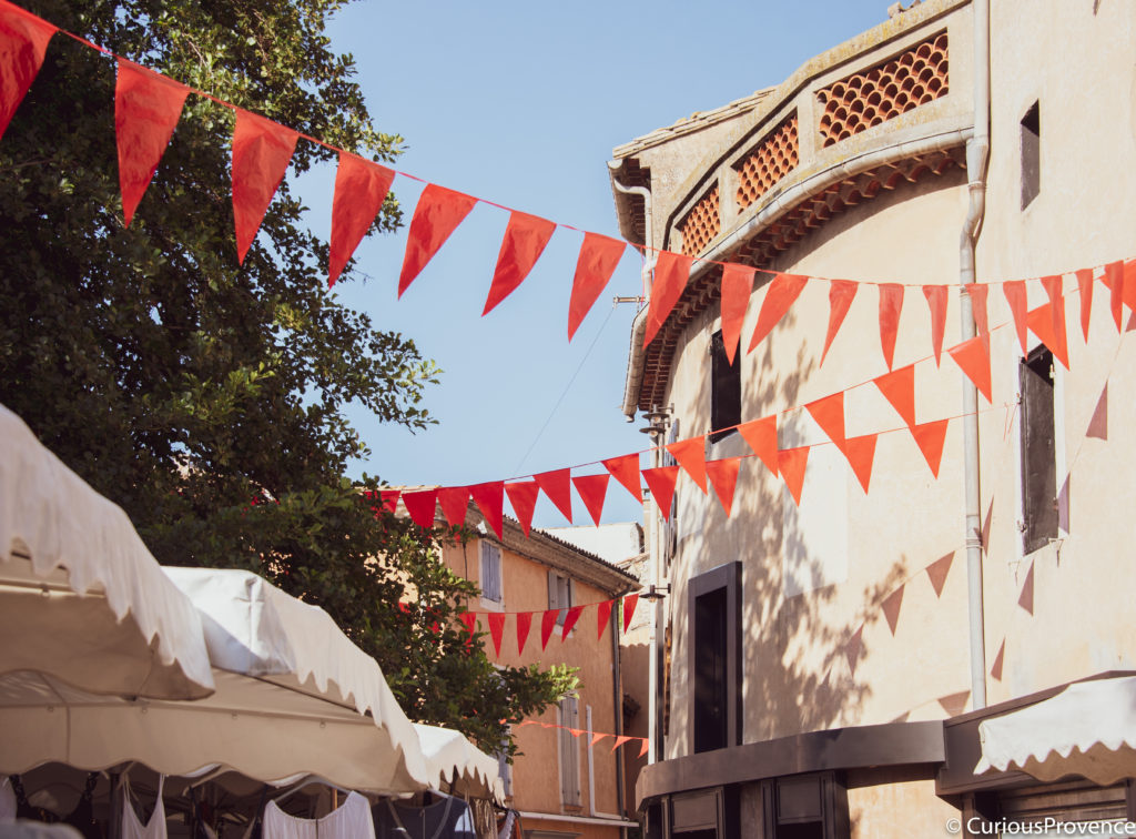 Isle sur la Sorgue market bunting in the streets